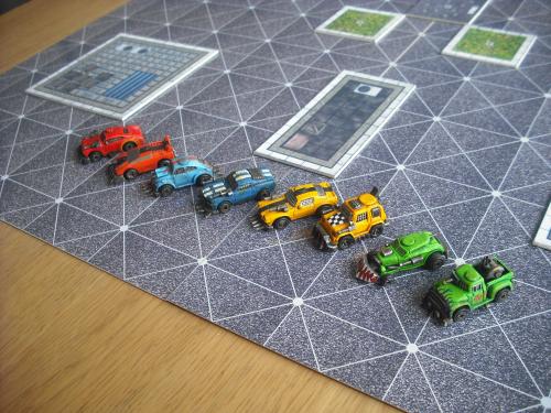 Cars ready for Action. 4 to 8 players, play as teams or 2 cars each